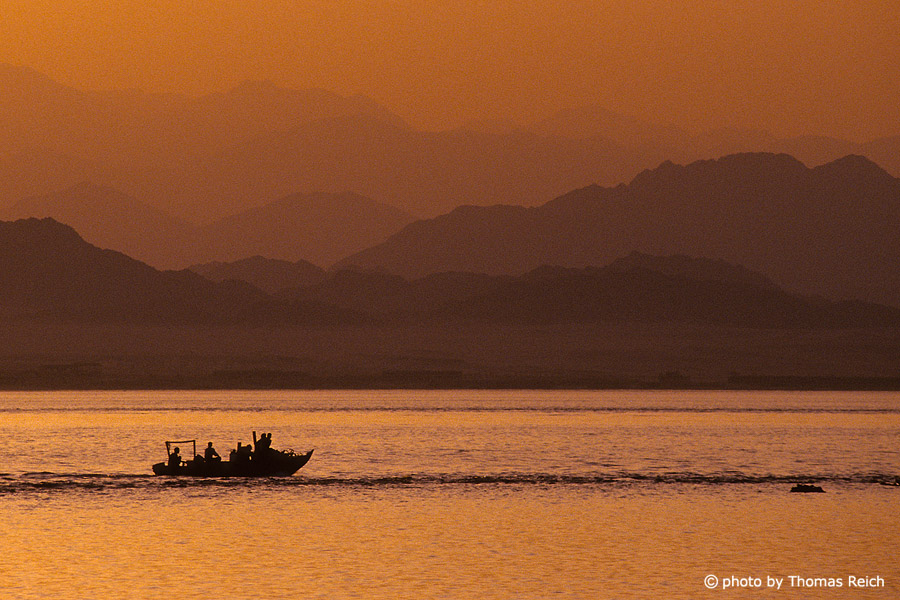 Silhouette Bedouin fishing boat in the Red Sea, Egypt