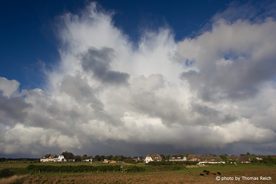 Amrum Norddorf with rainy clouds