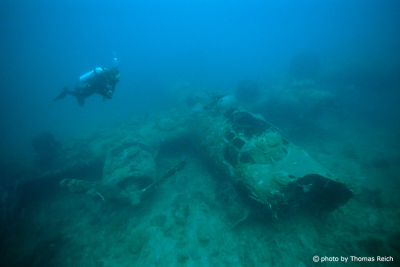Diver at B24 Liberator, Togian Islands, Sulawesi in Indonesia