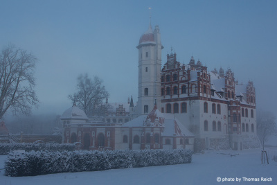 Basedow Castle with snow and fog