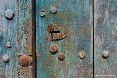 Blue wooden door in Oman