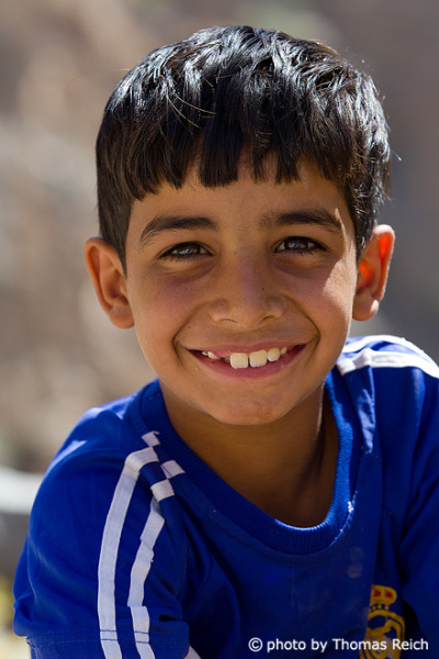 Young boy in mountain village, Oman