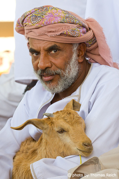 Man with goat, Oman