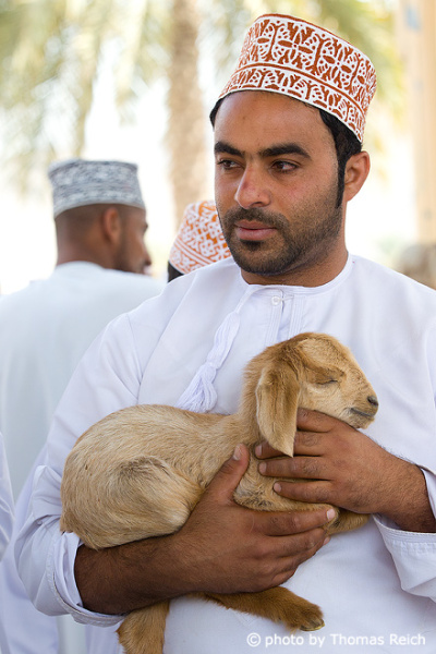 Goat, Man in Nizwa, Oman