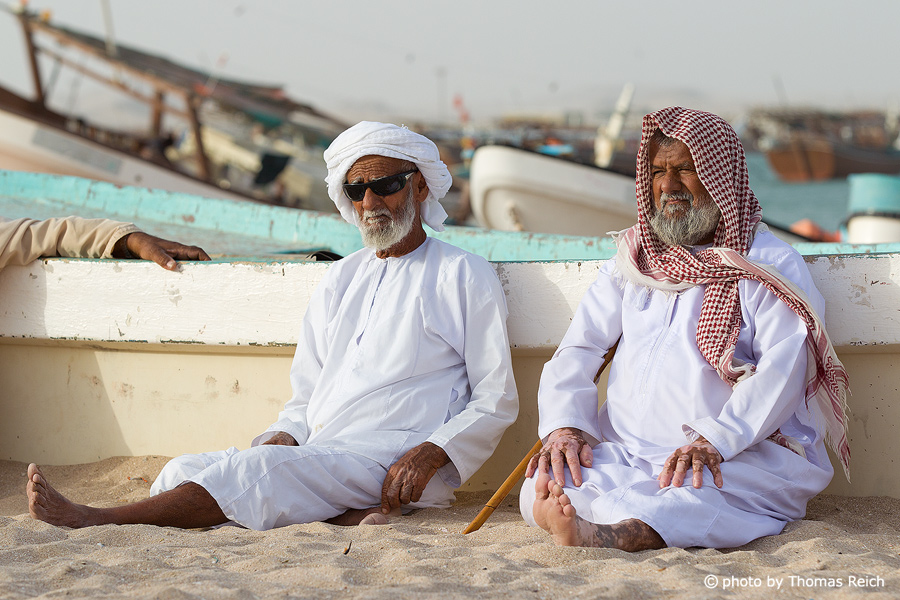 Einheimische im Fischerdorf, Oman