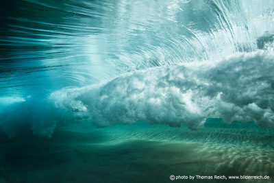 Underwater photo of breaking sea wave