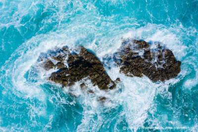 Sea waves wash rocks