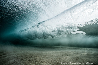 Breaking wave under water view