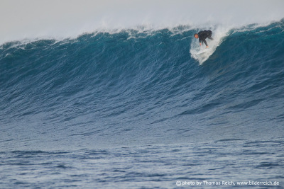 Big Wave Surfer Take-Off