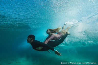 Underwater model couple in the ocean