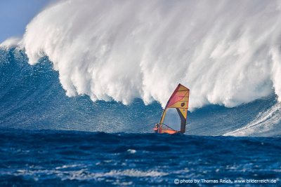 Windsurfing with giant sea waves