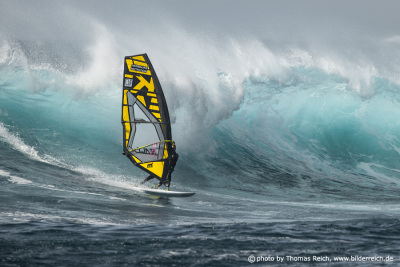 Windsurfer riding a wave